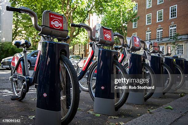 Santander Cycles are parked in their docking station in central London on June 22, 2015 in London, England. Spanish bank Santander have taken over...