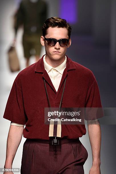 Model walks the runway at the Canali Spring Summer 2016 fashion show during Milan Menswear Fashion Week on June 22, 2015 in Milan, Italy.
