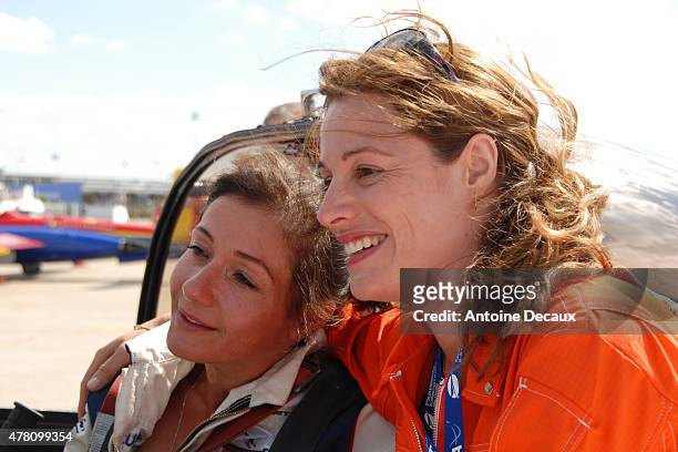 Pilot Dorine Bourneton celebrates with Jane Planchon, first woman piloting a Canadair firefighter aircraft, after she took part in the first...