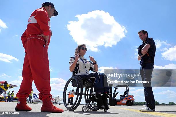 Pilot Dorine Bourneton rehearses her flight with Regis Alajouanine and Romain Vienne, before taking part in the first worldwide aerobatic show...