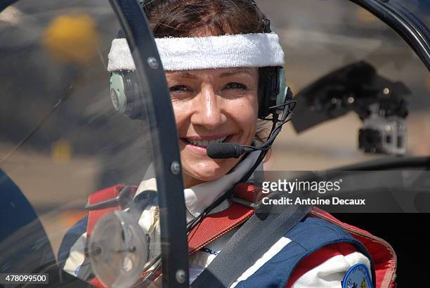 Pilot Dorine Bourneton poses before taking part in the first worldwide aerobatic show performed by a paraplegic woman, at the Paris Air Show 2015 in...