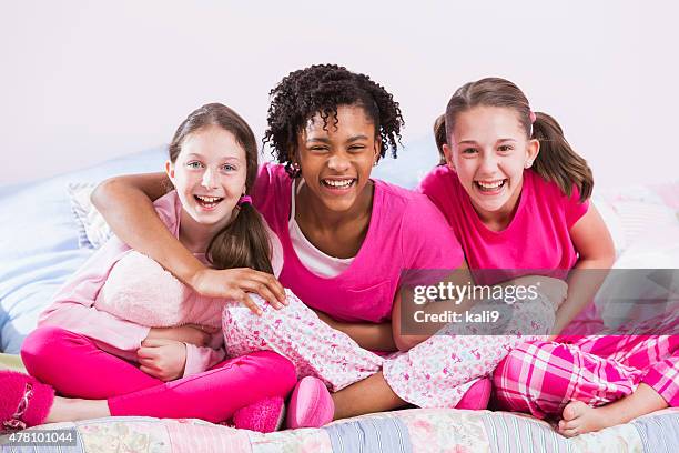 multiethnic preteen girls having slumber party - flickbaby bildbanksfoton och bilder