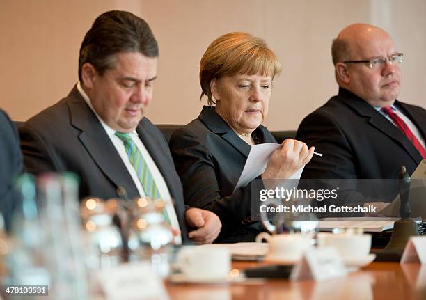 German Economy Minister and Vice Chancellor Sigmar Gabriel , German Chancellor Angela Merkel and Head of the German Chancellery Peter Altmaier,...