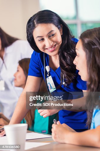 Medical Instructor Nursing Instructor Teaching Medical Student In College Classroom High ...