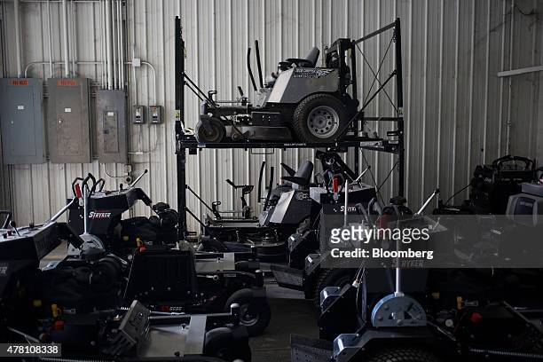 Completed lawnmowers stand before being shipped from the Dixie Chopper manufacturing facility in Coatesville, Indiana, U.S., on Friday, June 12,...