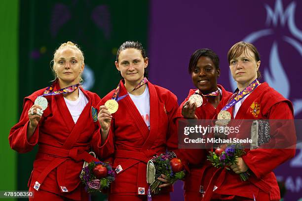 Silver medalist Olena Sayko of Ukraine, gold medalist Tatsiana Matsko of Belarus and bronze medalists Sarah Loko of France and Anna Shcherbakova of...