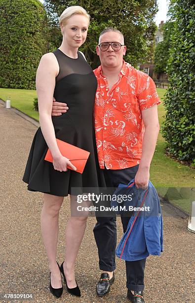 Gwendoline Christie and Giles Deacon attend The Ralph Lauren & Vogue Wimbledon Summer Cocktail Party hosted by Alexandra Shulman and Boris Becker at...