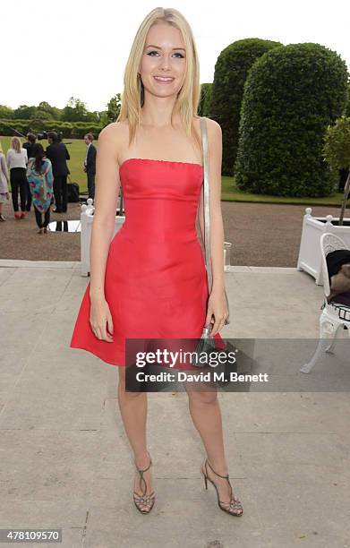 Lottie Moss attends The Ralph Lauren & Vogue Wimbledon Summer Cocktail Party hosted by Alexandra Shulman and Boris Becker at The Orangery at...