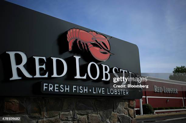 Red Lobster signage is displayed outside of a restaurant location in Clarksville, Indiana, U.S., on Monday, June 22, 2015. Red Lobster is a casual...