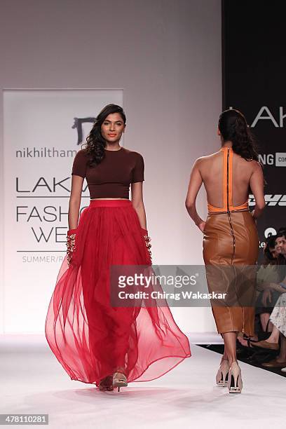 Model walks the runway wearing designs by Nikhil Thampi at day 2 of Lakme Fashion Week Summer/Resort 2014 at the Grand Hyatt on March 12, 2014 in...