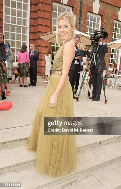 Mollie King attends The Ralph Lauren & Vogue Wimbledon Summer Cocktail Party hosted by Alexandra Shulman and Boris Becker at The Orangery at...