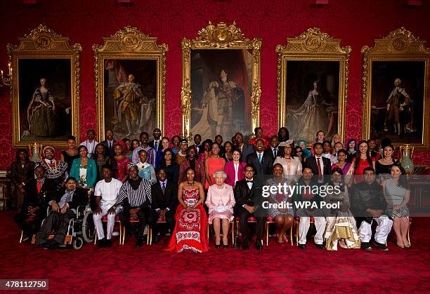 Queen Elizabeth II joins Young Leaders from across the Commonwealth at Buckingham Palace, Alain Nteff , Samuel Karuita , Karuna Rana , Isaiah Owolabi...