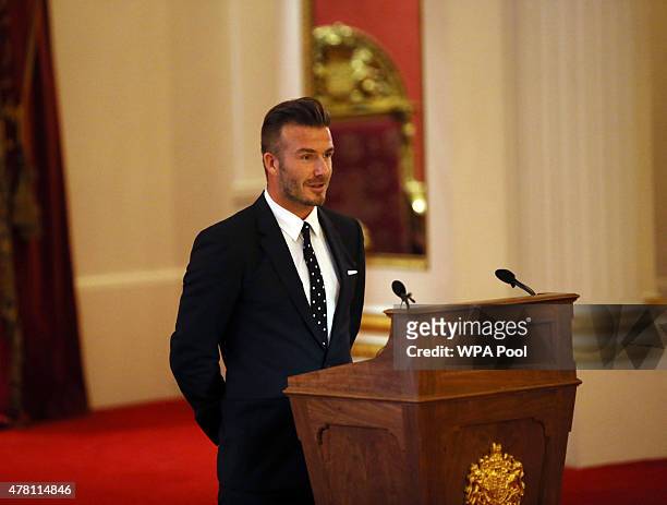 David Beckham gives a speech at a reception at Buckingham Palace to celebrate The Queen's Young Leaders programme and present awards to the first...