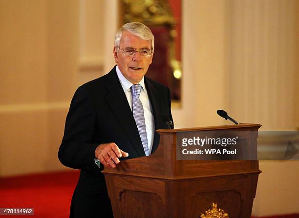 Sir John Major gives a speech at a reception at Buckingham Palace to celebrate The Queen's Young Leaders programme and present awards to the first...