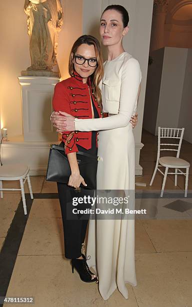 Maria Hatzistefanis and Erin O'Connor attend The Ralph Lauren & Vogue Wimbledon Summer Cocktail Party hosted by Alexandra Shulman and Boris Becker at...