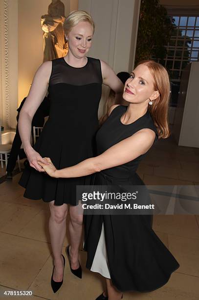 Gwendoline Christie and Jessica Chastain attend The Ralph Lauren & Vogue Wimbledon Summer Cocktail Party hosted by Alexandra Shulman and Boris Becker...
