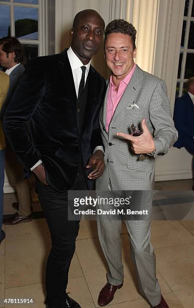 Ozwald Boateng and Jeremy Healy attend The Ralph Lauren & Vogue Wimbledon Summer Cocktail Party hosted by Alexandra Shulman and Boris Becker at The...