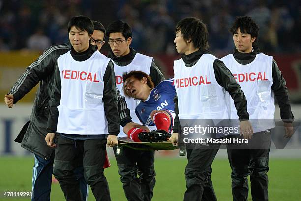 Shingo Hyodo of Yokohama F.Marinos injured during the AFC Champions League Group G match between Yokohama F.Marinos and Guangzhou Evergrande at...