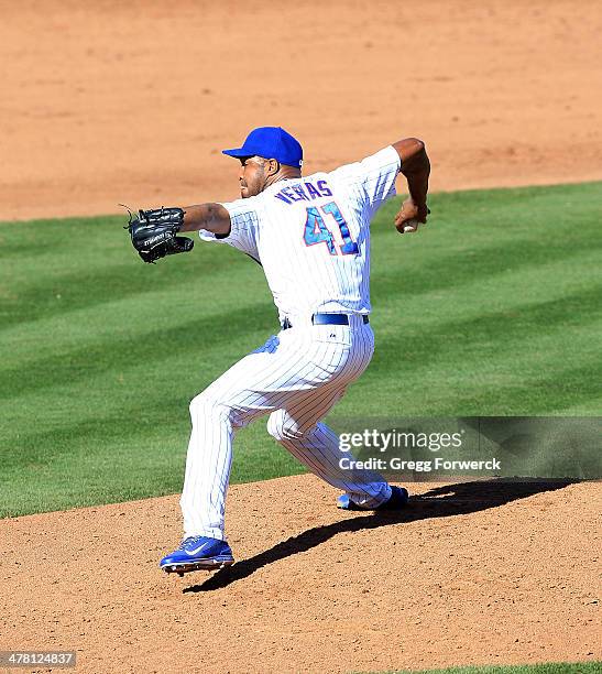 Jose Veras of the Chicago Cubs pitches against the Arizona Diamondbacks during a spring training game at Cubs Park on February 27, 2014 in Mesa,...