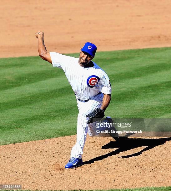 Jose Veras of the Chicago Cubs pitches against the Arizona Diamondbacks during a spring training game at Cubs Park on February 27, 2014 in Mesa,...