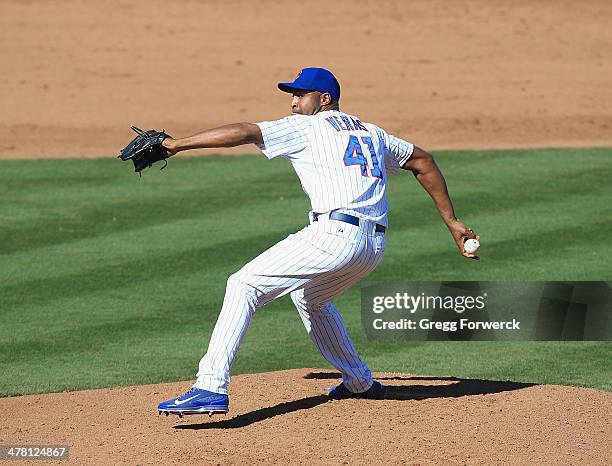 Jose Veras of the Chicago Cubs pitches against the Arizona Diamondbacks during a spring training game at Cubs Park on February 27, 2014 in Mesa,...