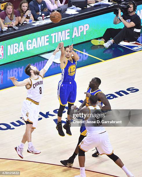 Stephen Curry of the Golden State Warriors takes a shot against the Cleveland Cavaliers in Game Six of the 2015 NBA Finals at The Quicken Loans Arena...