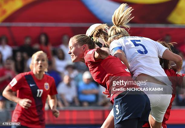 England's Steph Houghton heads the ball despite Norway's Marita Skammelsrud to score during a 2015 FIFA Women's World Cup Round of 16 football match...