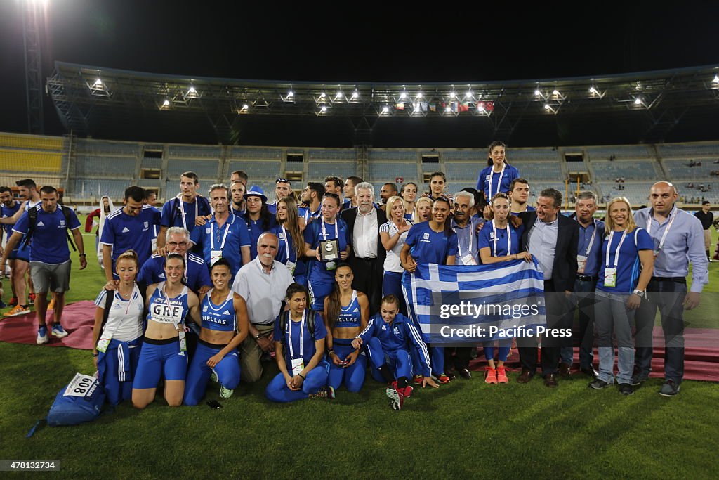 The second placed Greek team poses for the press. The team...