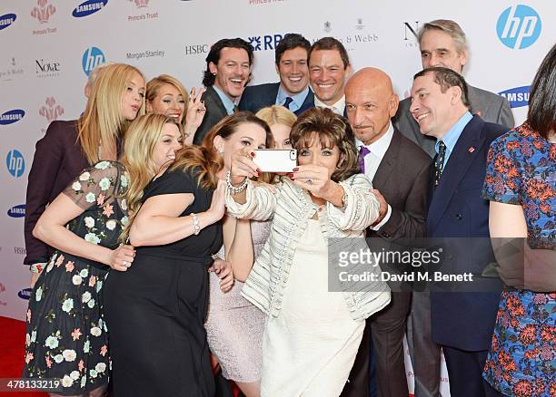 Joan Collins takes a selfie with fellow guests including Anna Williamson, Laura Whitmore, Tess Daly, Sam Bailey, Luke Evans, Pixie Lott, Vernon Kay,...