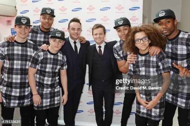 Anthony McPartlin and Declan Donnelly aka Ant and Dec pose with members of British dance troop Diversity at The Prince's Trust & Samsung Celebrate...