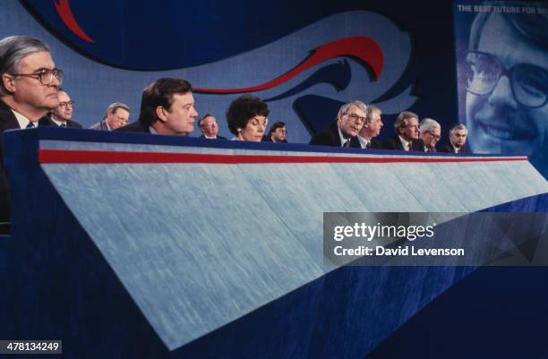 John Major, British Prime Minister, with the Cabinet, addresses a Conservative Party General Election Press Conference on March 18, 1992 in London,...