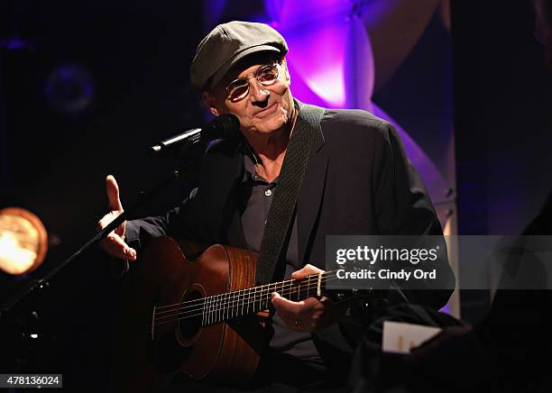 Singer-songwriter James Taylor performs during iHeartRadio ICONS with James Taylor presented by P.C. Richard & Son at iHeartRadio Theater on June 22,...