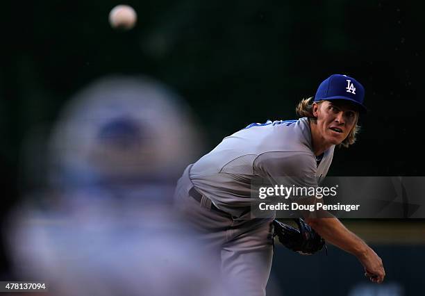 Starting pitcher Zack Greinke of the Los Angeles Dodgers works against the Colorado Rockies during game two of a double header at Coors Field on June...