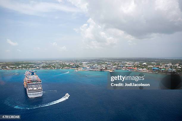 carnival breeze cruise ship anchored in george town, grand cayman - george town grand cayman stock pictures, royalty-free photos & images