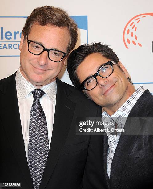 Actors Bob Saget and John Stamos arrive for "Cool Comedy - Hot Cuisine" To Benefit The Scleroderma Research Foundation held at the Beverly Wilshire...