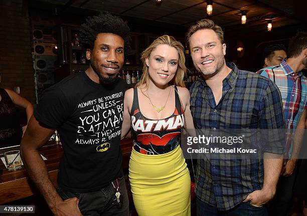 Actors Nyambi Nyambi, Clare Grant, and Scott Porter attend the Batman: Arkham Knight VIP Launch at The Line Hotel on June 22, 2015 in Los Angeles,...