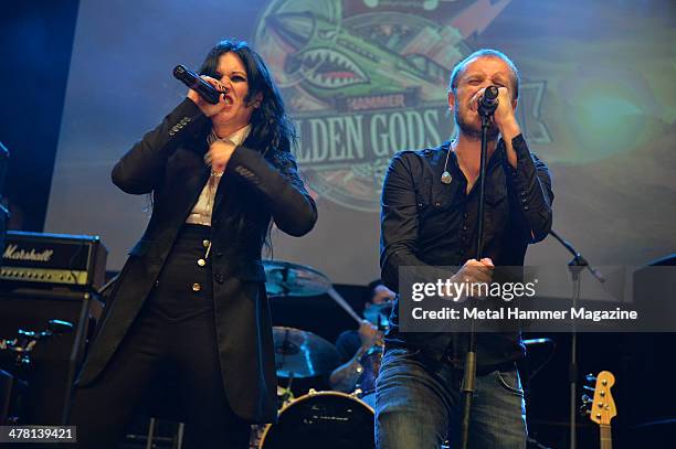 Guest vocalist Cristina Scabbia and frontman Nick Holmes of English doom metal group Paradise Lost performing live on stage at the 2013 Golden Gods...