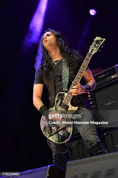 Greek guitarist Gus G performing live on stage as a guest musician with English doom metal group Paradise Lost at the 2013 Golden Gods Awards in the...