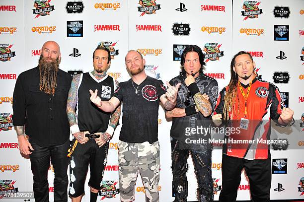 Chris Kael, Jeremy Spencer, Ivan Moody, Jason Hook and Zoltan Bathory of American heavy metal group Five Finger Death Punch photographed on the red...