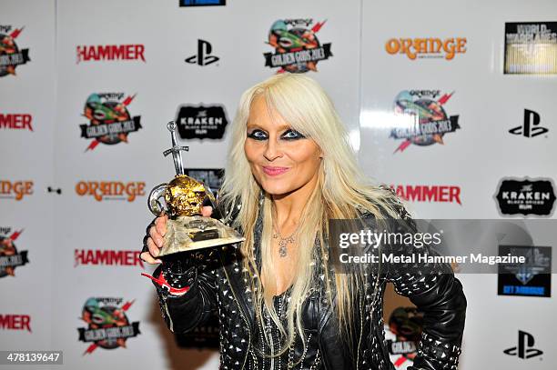 Dorothee Pesch, better known by her stage name Doro, of German heavy metal group Warlock photographed on the red carpet at the 2013 Golden Gods...