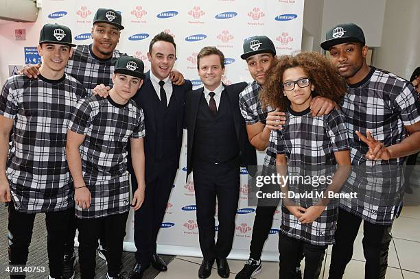 Anthony McPartlin and Declan Donnelly aka Ant and Dec pose with members of British dance troop Diversity at The Prince's Trust & Samsung Celebrate...