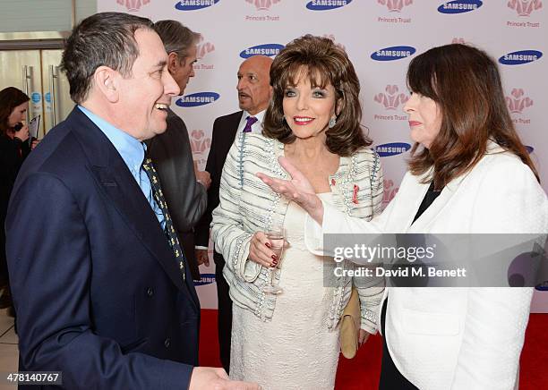 Jools Holland, Joan Collins and guest attend The Prince's Trust & Samsung Celebrate Success Awards at Odeon Leicester Square on March 12, 2014 in...