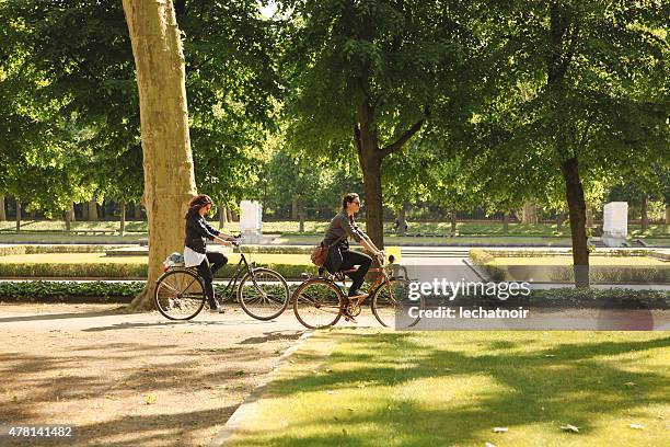 bicycle ride in the park - berlin bike stock pictures, royalty-free photos & images