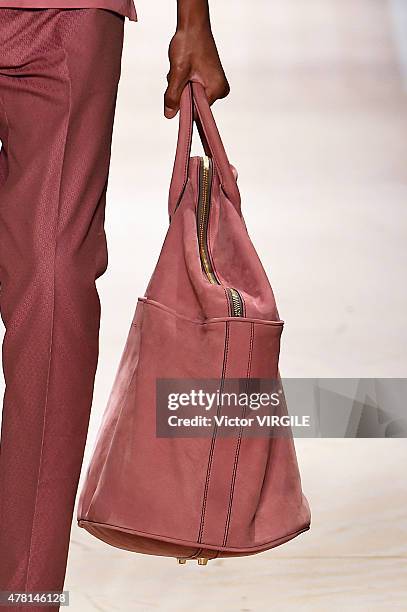 Model, bag detail, walks the runway during the Etro Ready to Wear fashion show as part of Milan Men's Fashion Week Spring/Summer 2016 on June 22,...