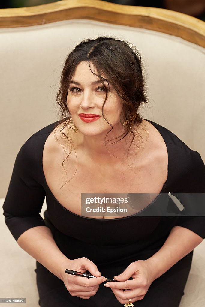 Monica Bellucci attends the photocall at Dolce & Gabbana shop at TSUM