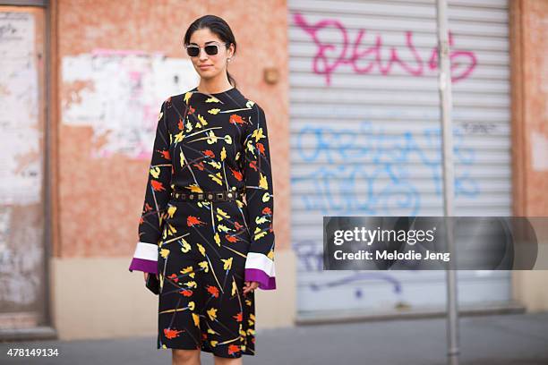 Caroline Issa wears Pucci poses on June 21, 2015 in Milan, Italy.