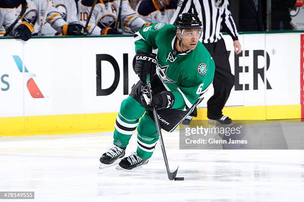 Trevor Daley of the Dallas Stars handles the puck against the Buffalo Sabres at the American Airlines Center on March 3, 2014 in Dallas, Texas.
