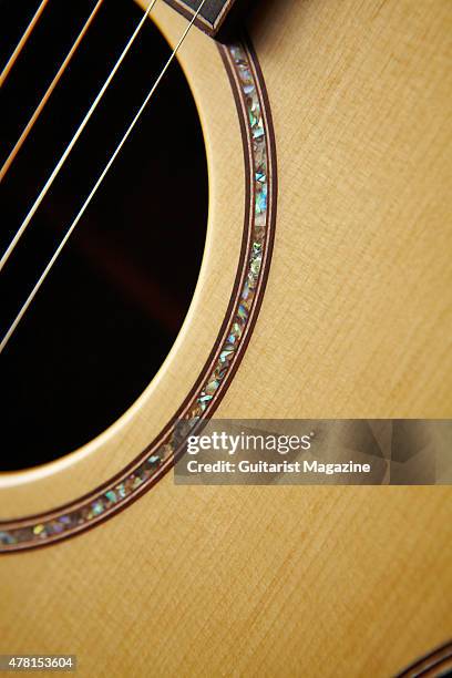 Detail of the sound hole purfling on an Avalon Ard Ri A3-335FC acoustic guitar, taken on November 11, 2014.
