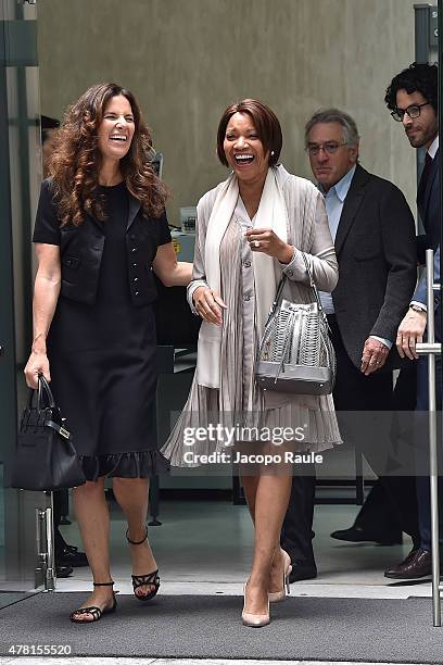 Roberta Armani and Grace Hightower leave the Armani Silos after the Giorgio Armani show during the Milan Men's Fashion Week Spring/Summer 2016 on...