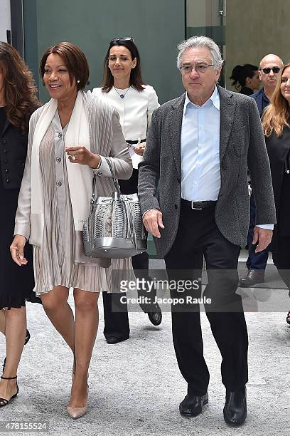 Grace Hightower and Robert De Niro leave the Armani Silos after the Giorgio Armani show during the Milan Men's Fashion Week Spring/Summer 2016 on...